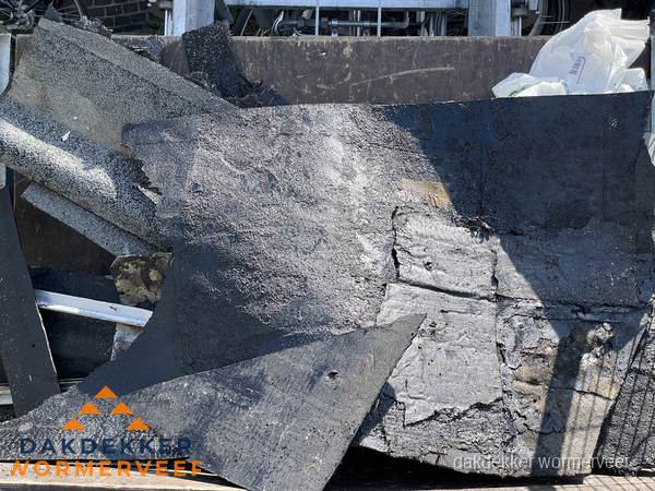 Kosten dakrenovatie: afvoer oud dakmateriaal in Wormerveer